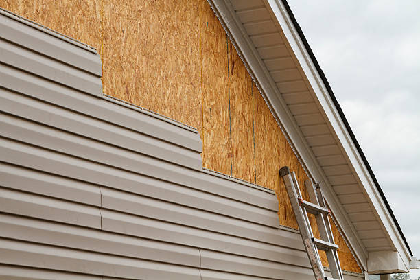 Professional Siding Installation technician working in Montgomery, WV